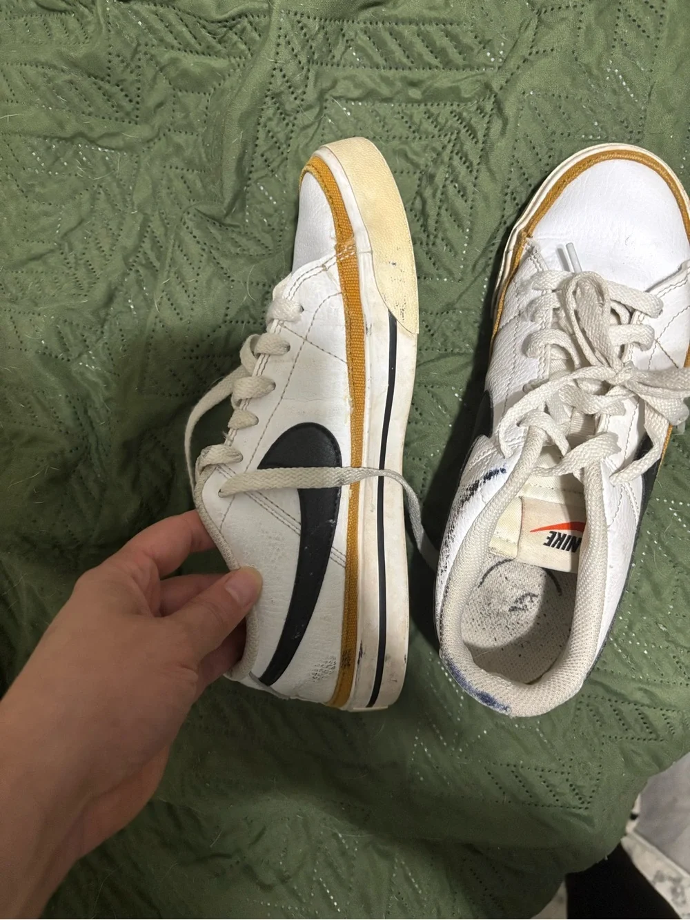 Nike White Leather Sneakers with Black Swoosh and Yellow Accent